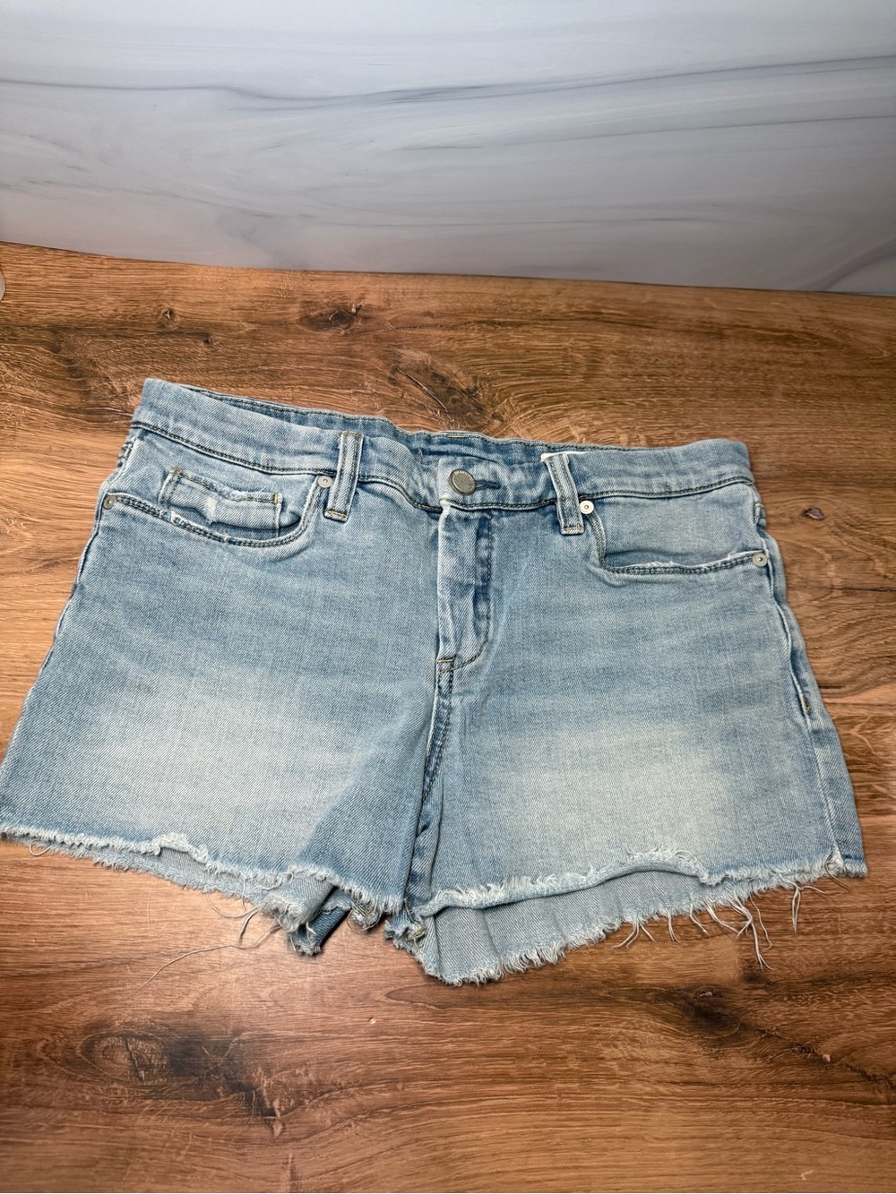 Blank NYC Washed Light Blue Frayed Hem Denim Shorts